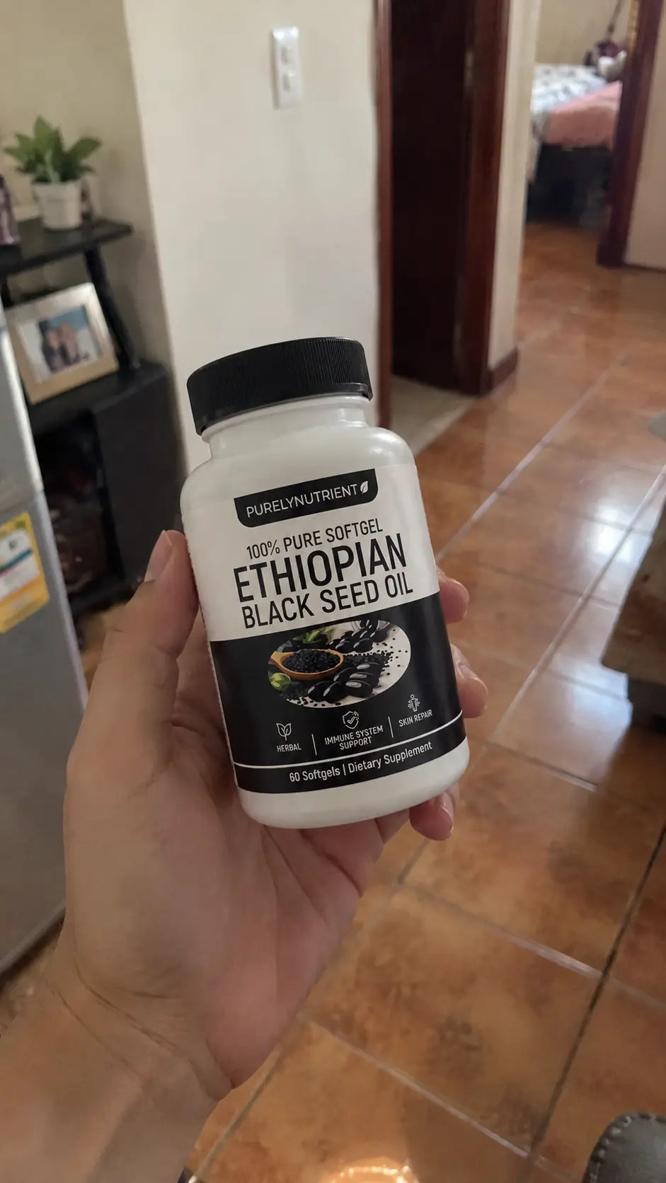 Cliente usando el aceite de semilla negra